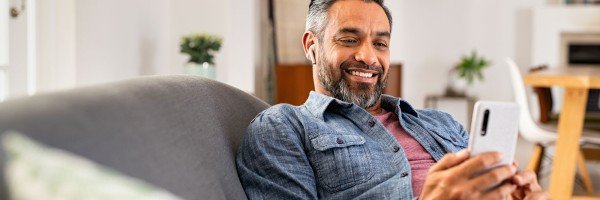 Broker browses Marsden Building Society's intermediary product range on his smartphone