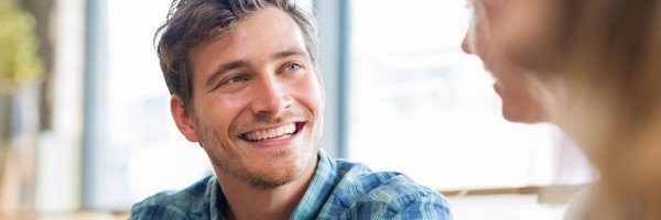 Head and shoulders image of young man smiling | Expat Buy to Let case study