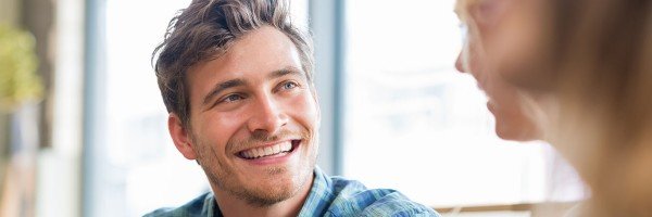 Head and shoulders image of young man smiling | Expat Buy to Let case study