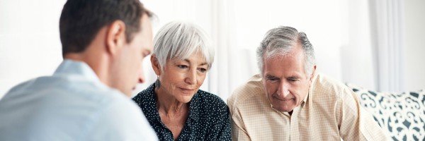 Older couple meet with an advisor to review their mortgage options