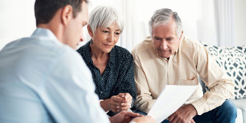 Older couple meet with an advisor to review their mortgage options